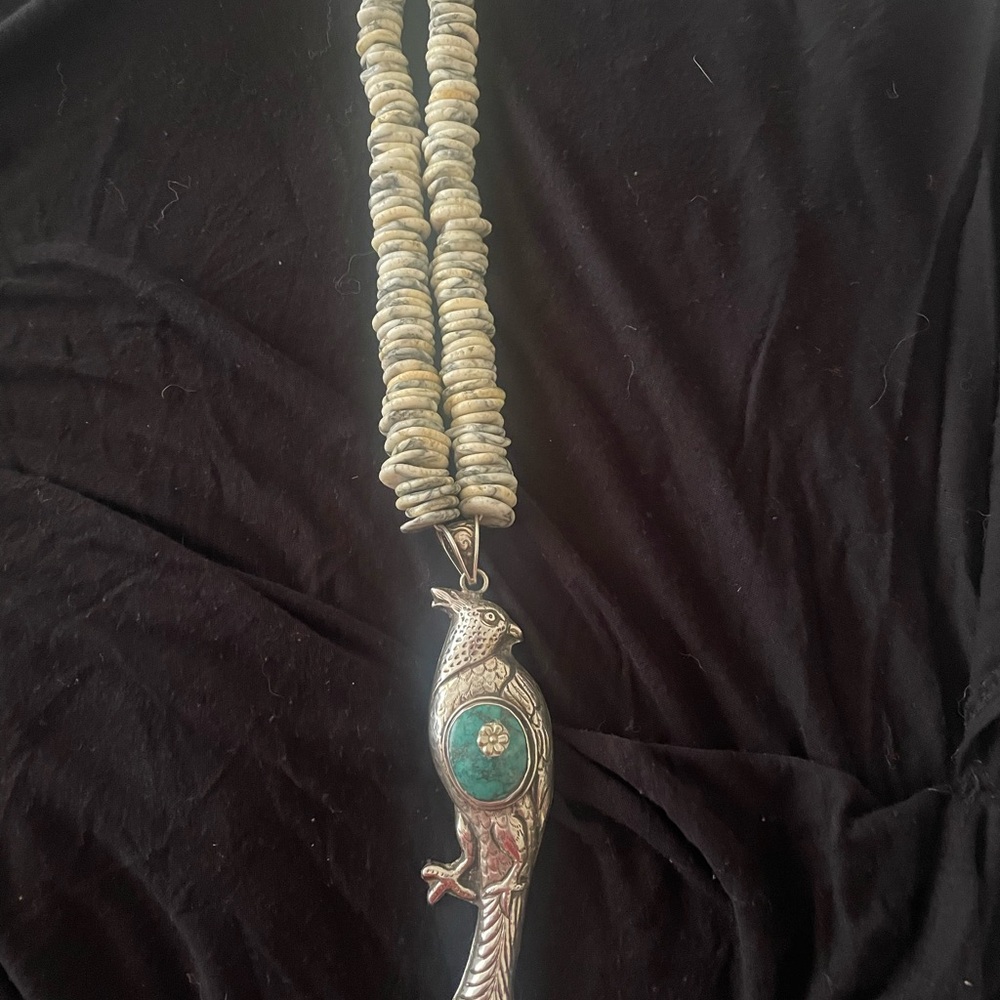 Tibetan style turquoise bird pendant necklace.